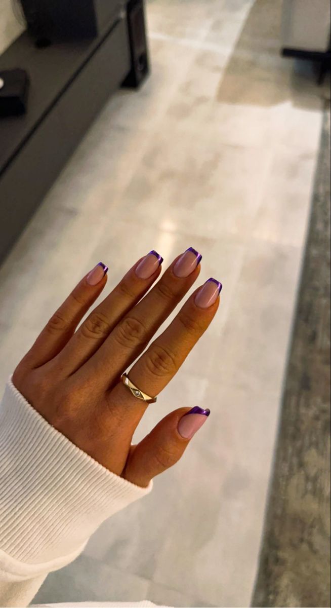 Chic Nail Design: Soft Nude Base with Striking Purple Tips