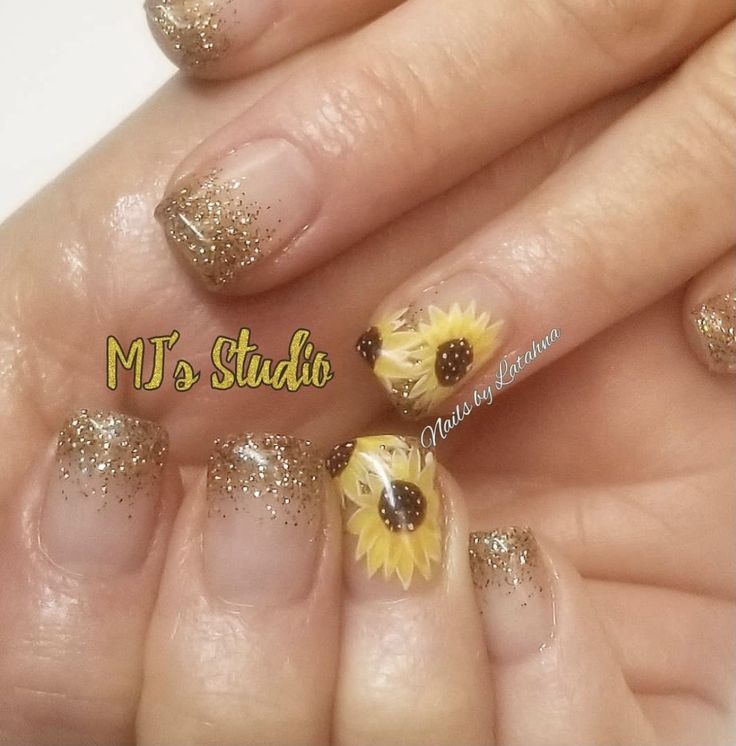 Cheerful Nail Design with Golden Glitter and Vibrant Sunflower Accents.