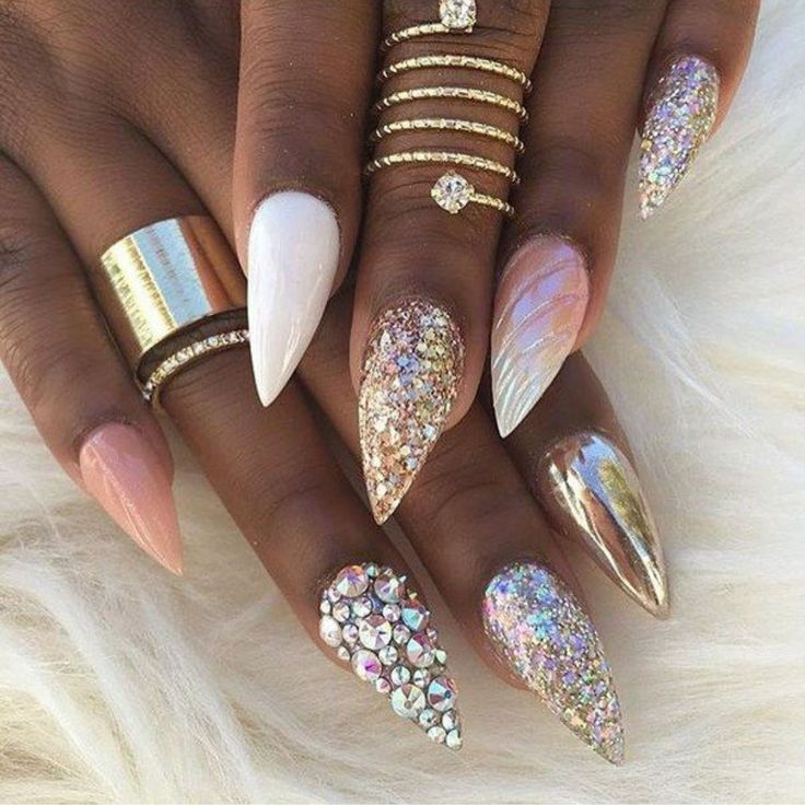 Vibrant Nail Design with Textures, Glitter, and Intricate Details.