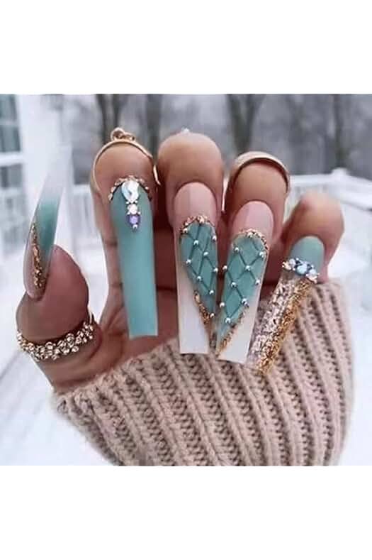 Luxurious Teal and White Tapered Nail Design with Gold Accents and Geometric Patterns.