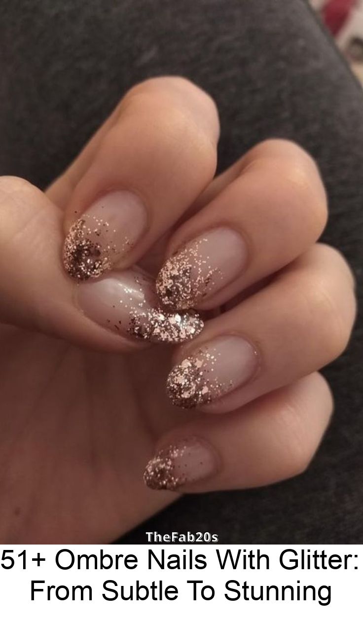 Ombre Glitter Nails: A Glamorous Gradient from Soft Nude to Sparkling Tips.