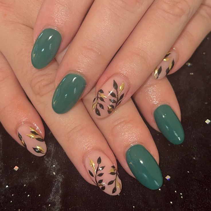 Sophisticated Teal Nail Design with Black and Gold Leaf Accents