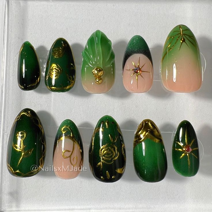 Elegant Green and Pink Nail Design with Intricate Gold Detailing