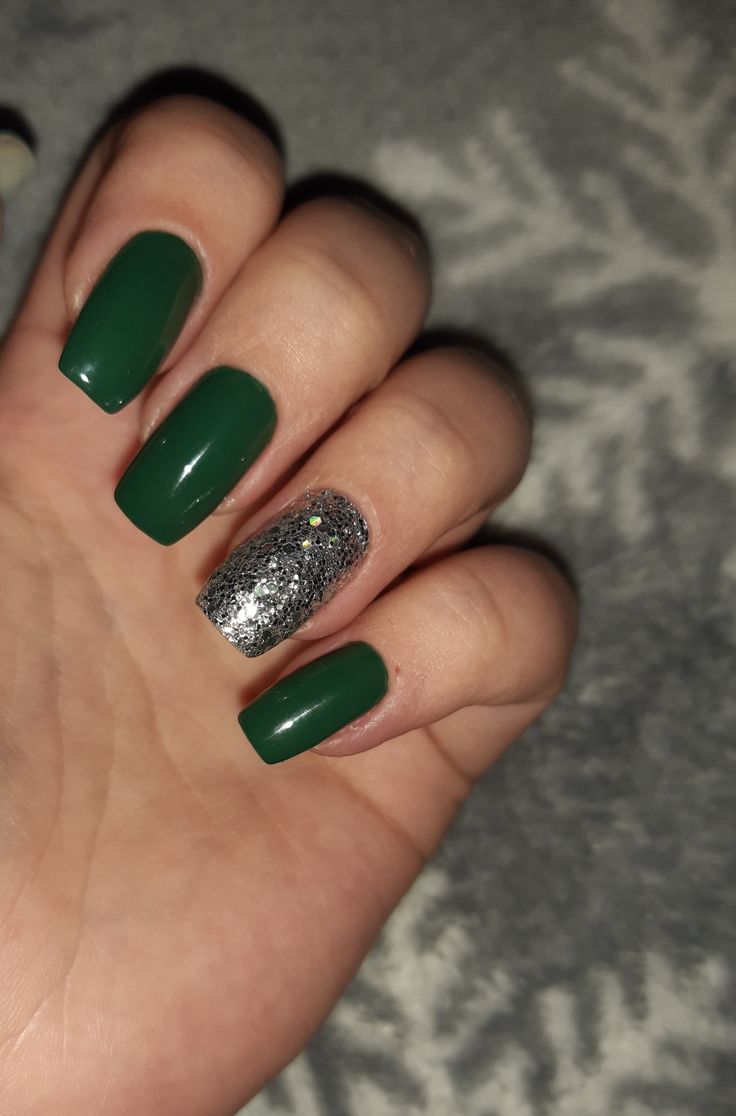 Bold & Elegant: Emerald Green Nails with Silver Glitter Accent