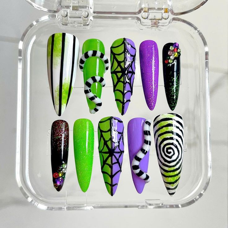 Vibrant Halloween Nail Design with Bold Colors and Festive Patterns