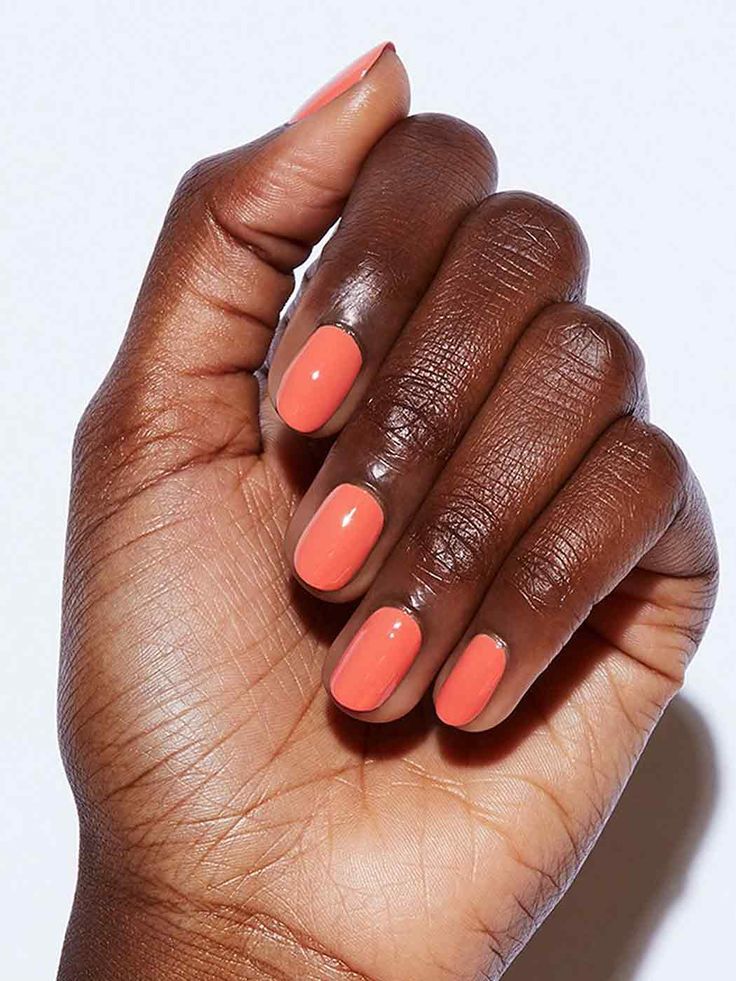 Chic Vibrant Coral Nail Design: A Perfect Blend of Modern Elegance and Playful Flair.