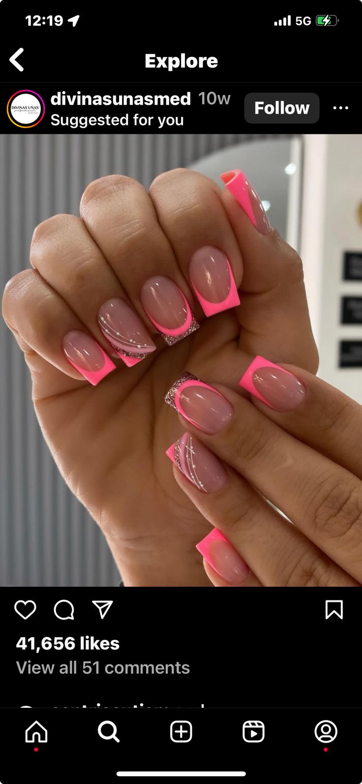 Chic Nail Design: Soft Pink Base with Neon Pink Tips and Elegant Silver Accents