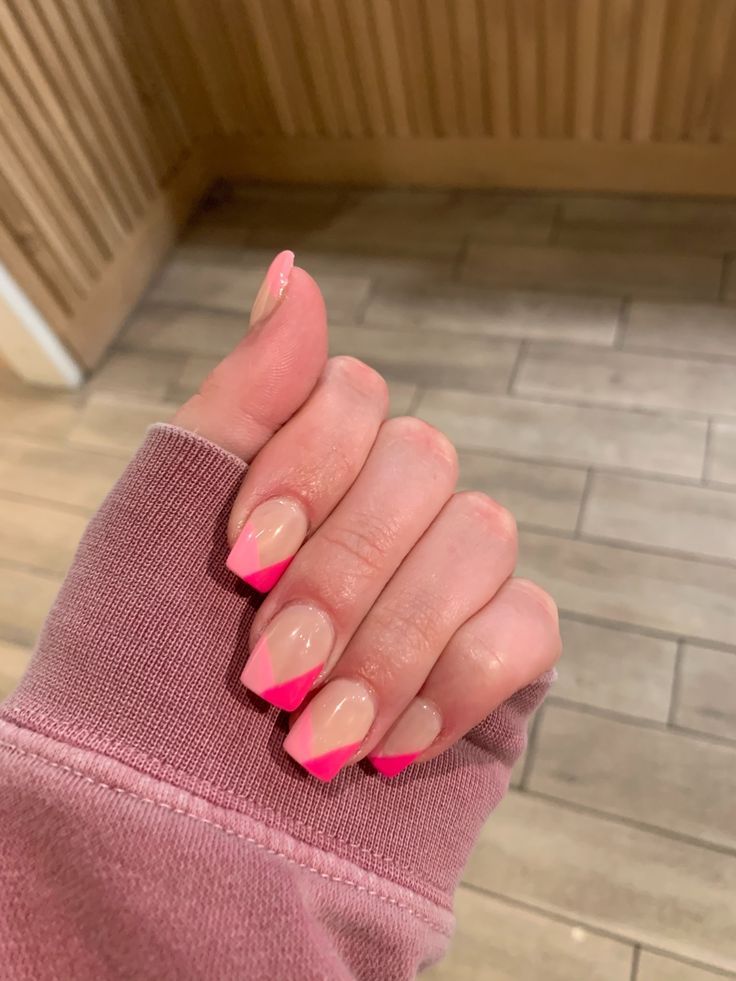 Bold Hot Pink Tips on Nude Base: A Modern and Eye-Catching Manicure Design