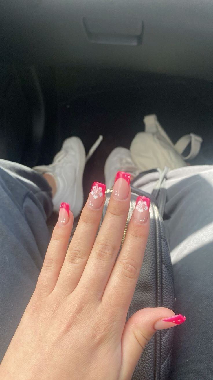 Playful Summer-Inspired Pink Acrylic Nails with Floral Accents