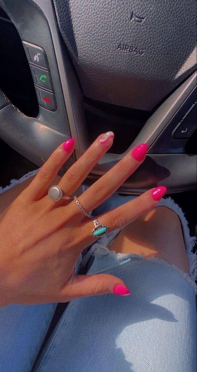 Chic Vibrant Pink Nail Design with Accents and Relaxed Denim Shorts for Stylish Summer Vibes.