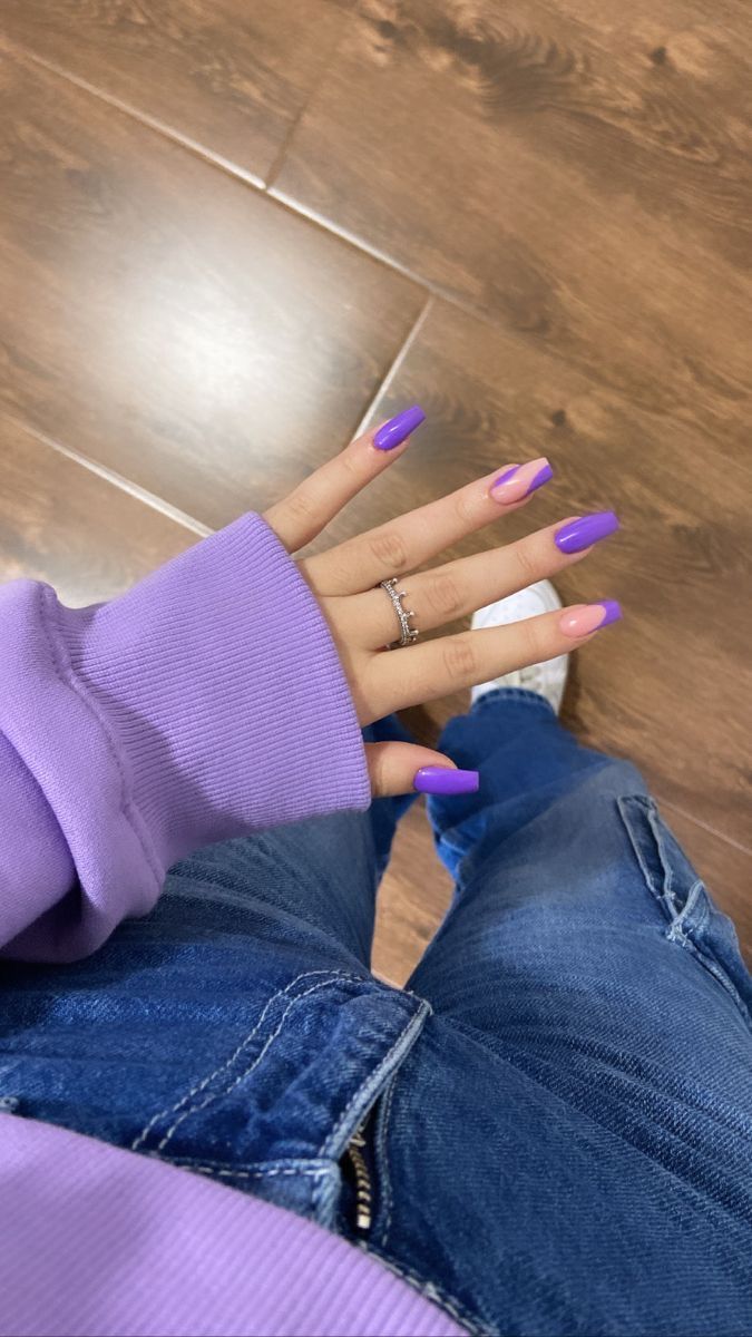 Bold and Elegant Vibrant Purple Nails: A Playful Chic Statement.