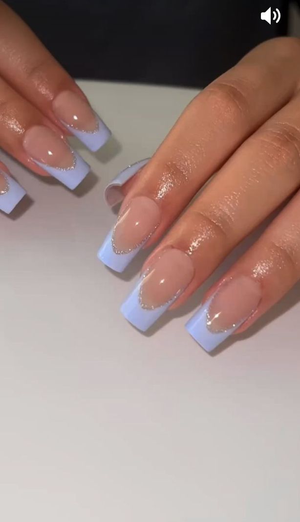 Elegant Soft Blue French Tip Nail Design with Chic Transparency and Delicate Outline.