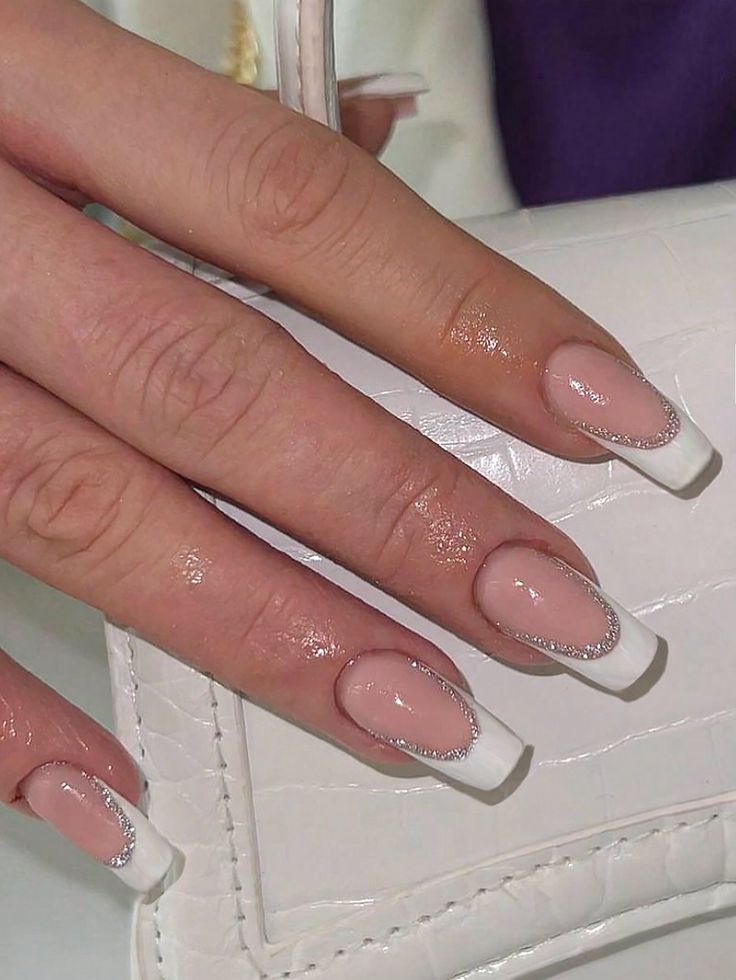 Chic Nude and White Nail Design with Sparkling Silver Accents