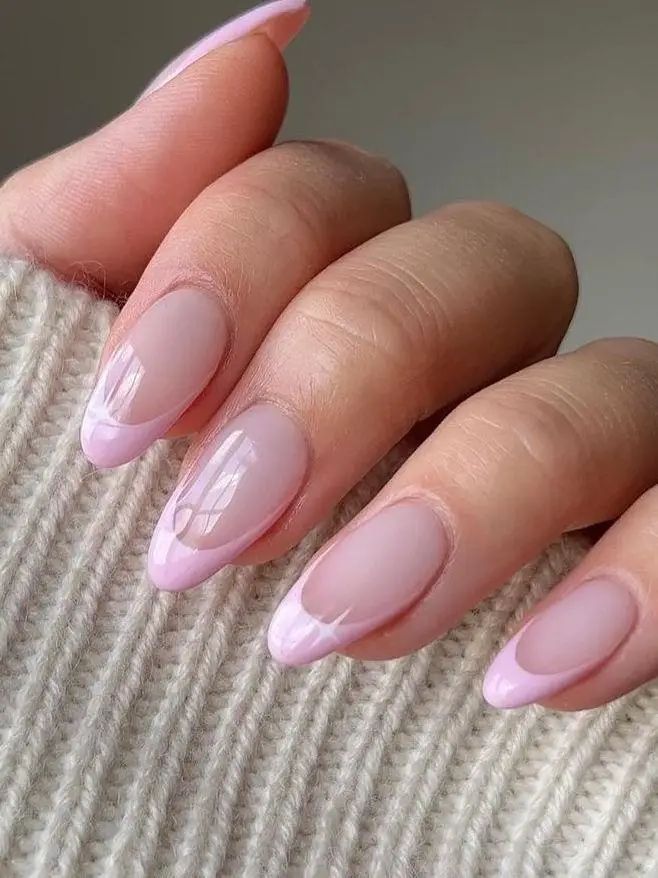 Chic Soft Pink Nail Design with Glossy Finish and Subtle French Tip.