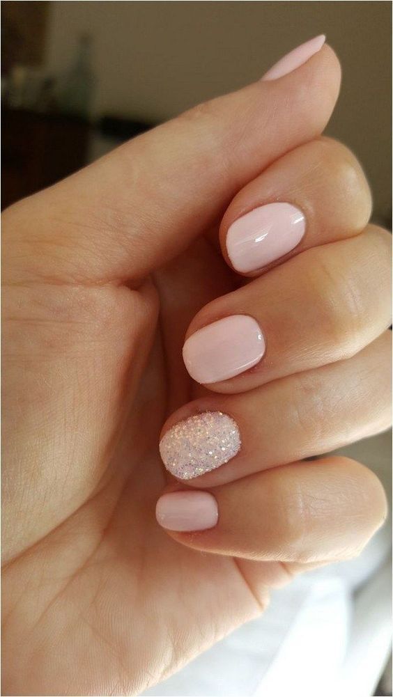 Elegant Soft Pink Nail Design with Sparkling Glitter Accent