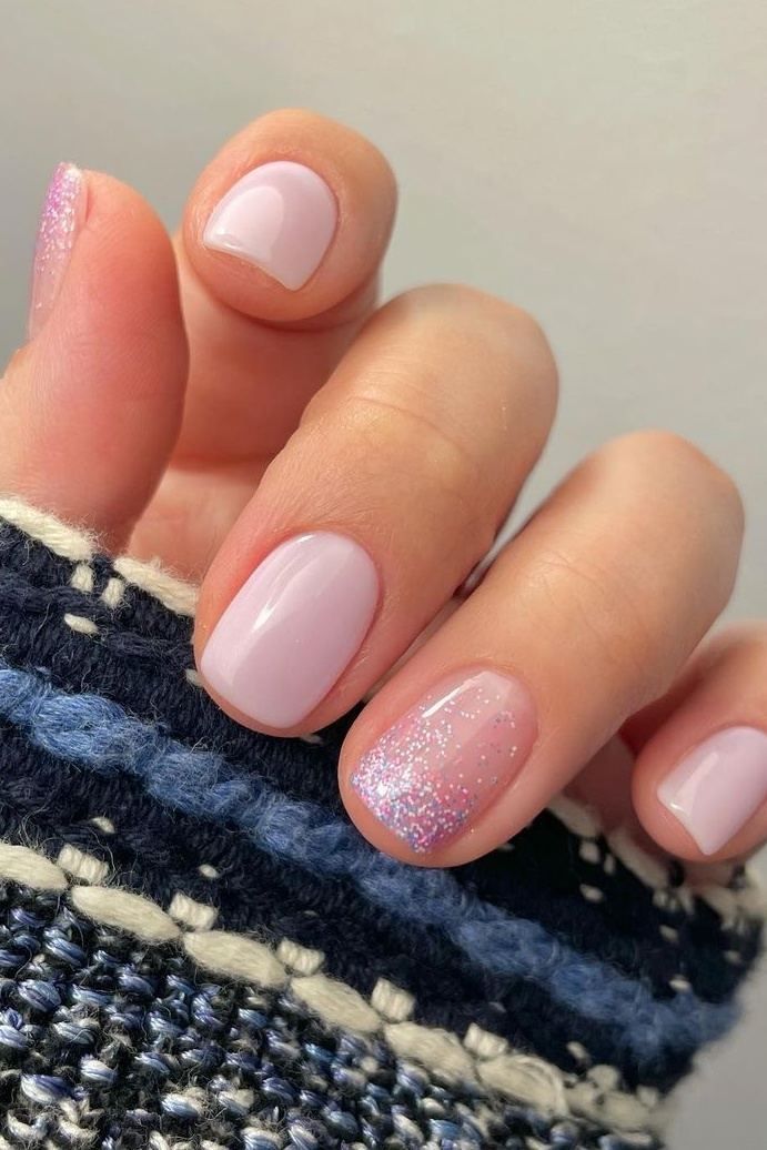 Elegant Pastel Lavender Nails with Subtle Glitter for a Serene Look.