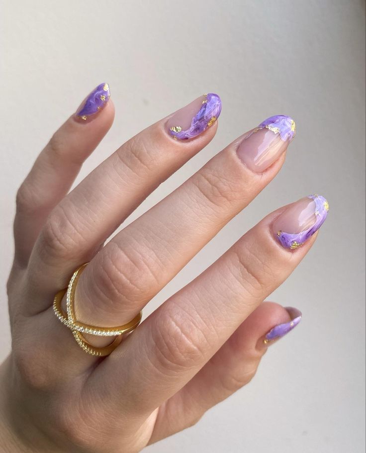 Chic Lavender French Tip Nail Design with Gold Accents and Ombre Finish.