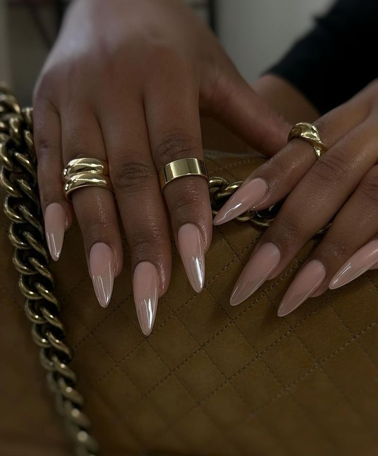 Chic Almond-Shaped Nails with Blush and White Tips: A Timeless Glamour.