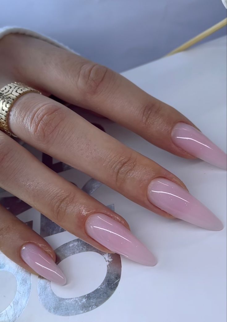 Sophisticated Almond-Shaped Nails with Glossy Pastel Pink Polish