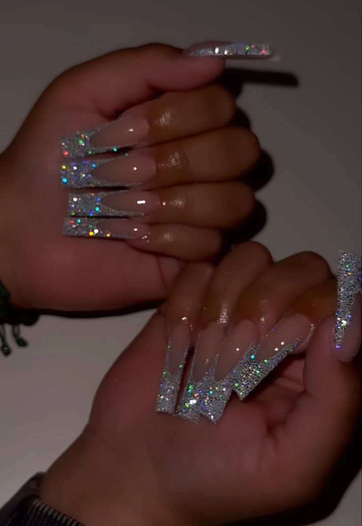 Elegant Glittering Nail Design with Holographic Accents for Glamorous Moments.