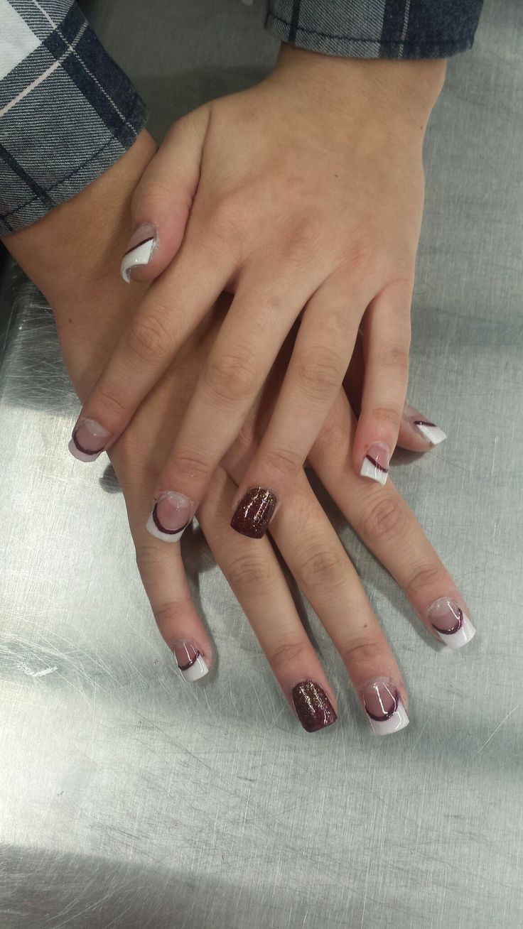 Chic Nail Design Blending Classic French Manicure with Modern Burgundy Glitter Accents and Gradient Effects.