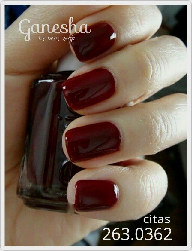 Sophisticated Dark Burgundy Nails: A Striking Choice for Any Occasion.