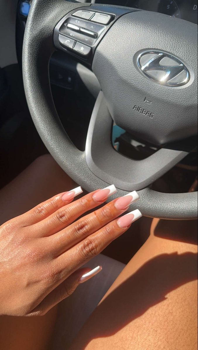 Elegant Ombre French Tip Long Nails: Perfectly Manicured for Any Occasion.