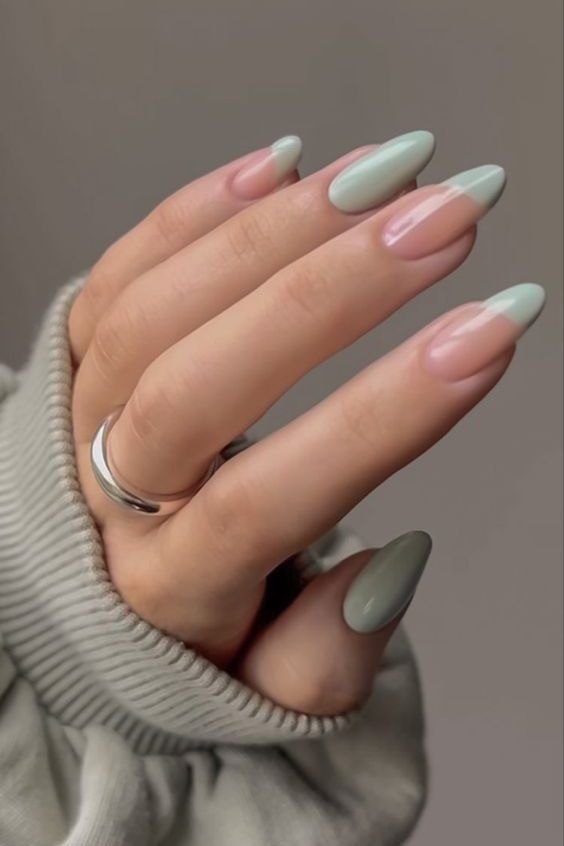 Chic Almond-Shaped Nails: A Dreamy Blend of Pastel Green and Unique Color Blocking