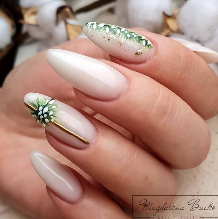 Chic Almond-Shaped Nails with Floral Designs in Nude and Glossy White Finishes.