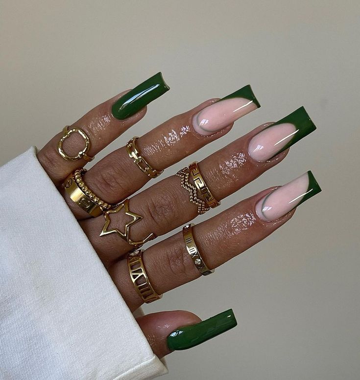 Sophisticated Chic Nail Design: Deep Green and Soft Nude Contrast with Sharp Tips