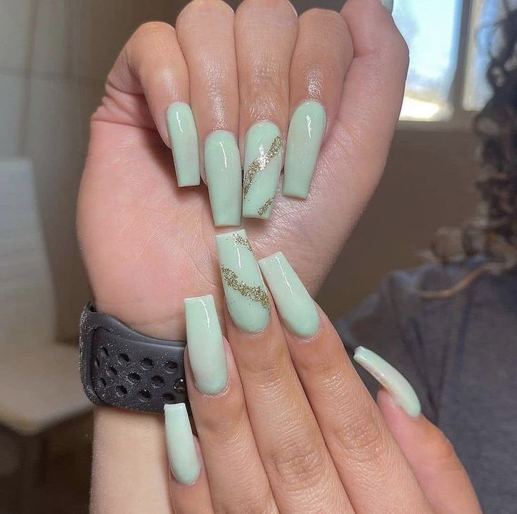 Chic Mint Green Nails with Gold Shimmer: A Versatile Design for Any Occasion