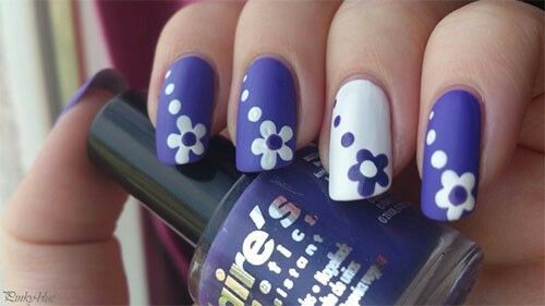 Vibrant Matte Nail Design with Deep Purple and White Floral Accents.