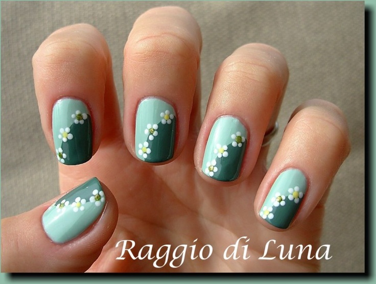 Chic Floral Nail Design in Mint and Green with Delicate Flower Accents.