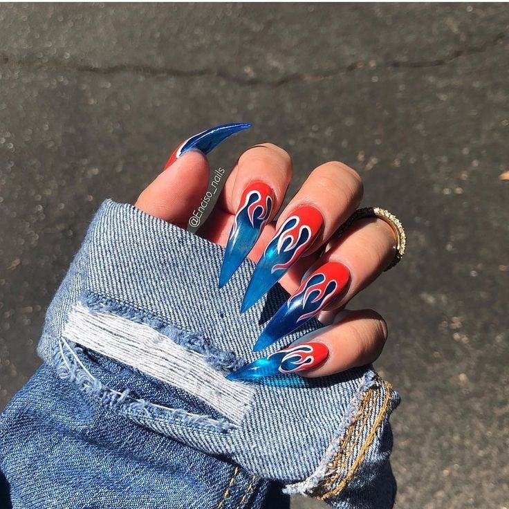 Edgy Flame-Inspired Nail Art: Stiletto Design with Striking Red and Blue Gradients