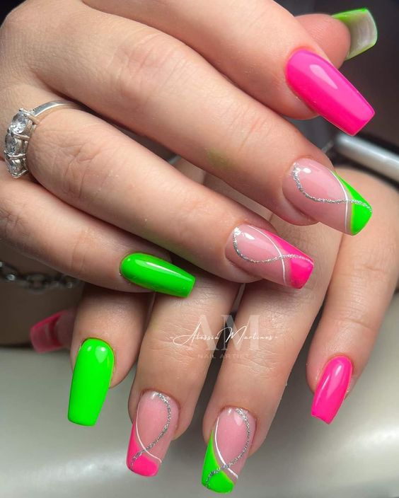 Vibrant Green and Pink Nail Design with Glossy Finishes and Sparkling Accents.