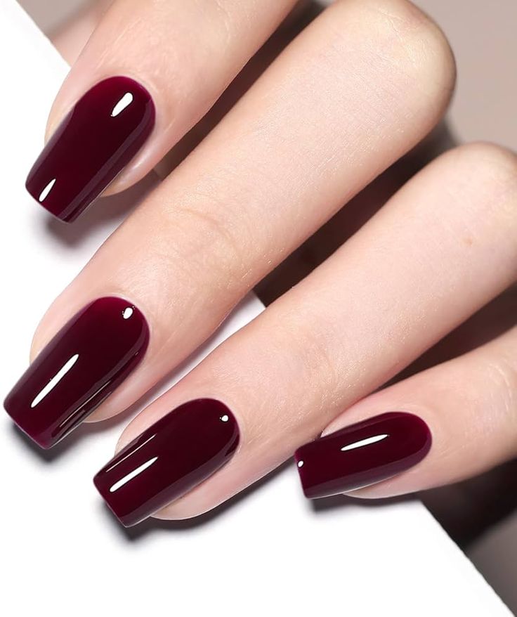 Sophisticated Deep Burgundy Nails with Glossy Finish for Any Occasion