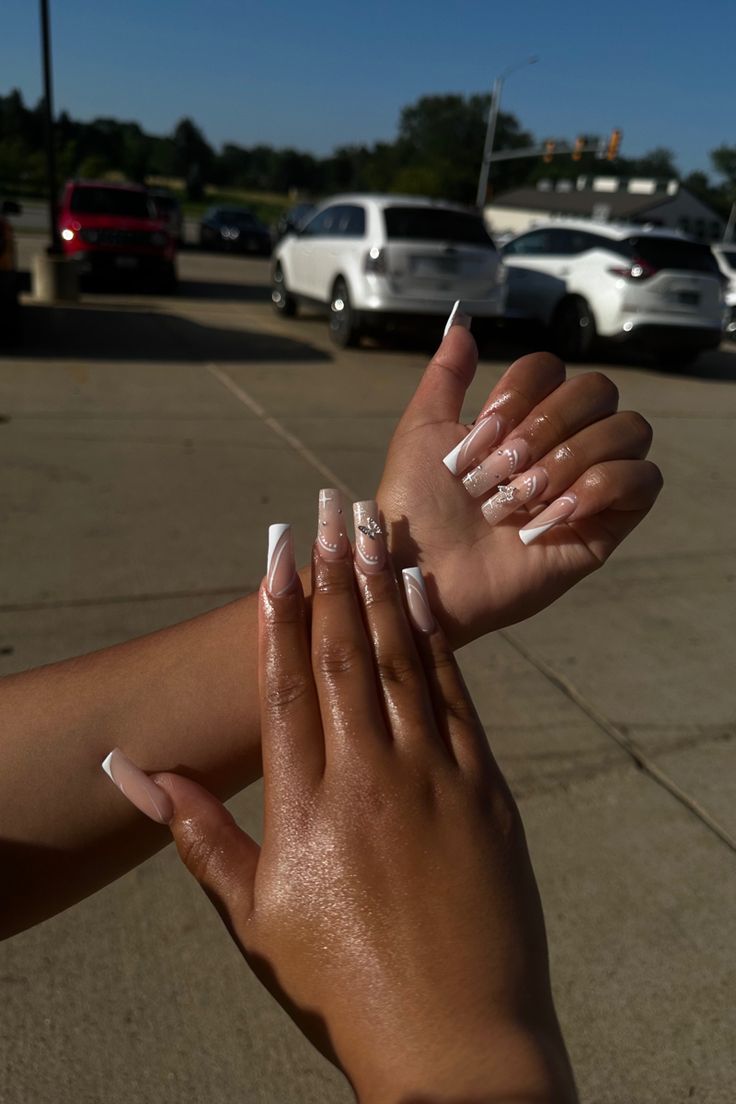 Chic Gradient Acrylic Nails with Soft Pink and White Embellishments