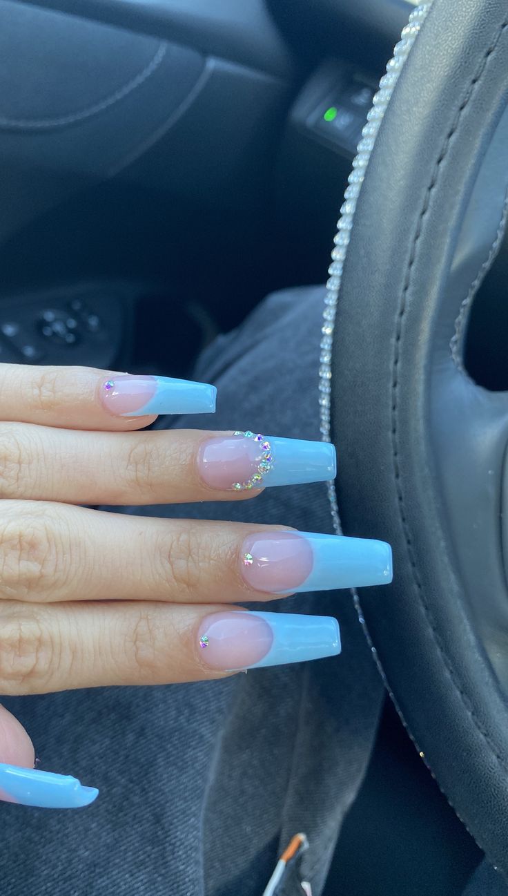 Chic Acrylic Nails in Soft Blue and Pastel Pink with Rhinestone Glamour.