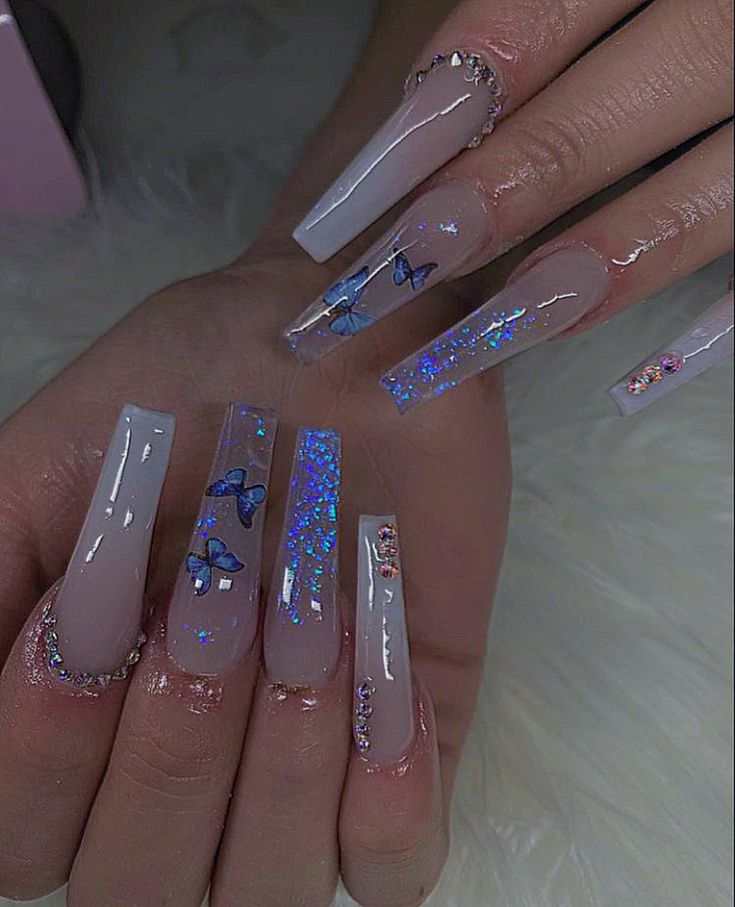 Chic Coffin-Shaped Acrylic Nails with Gem Accents and Butterfly Motifs