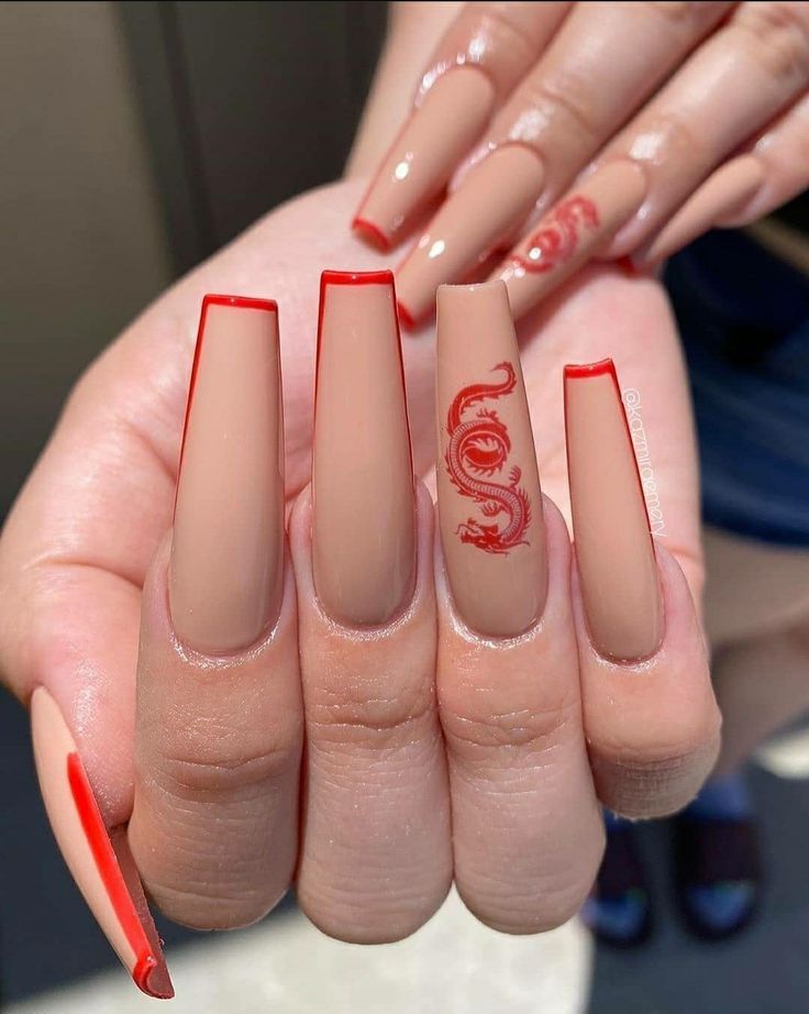 Edgy Sophistication: Long Nude Nails with Bold Red Edges and Striking Dragon Motif