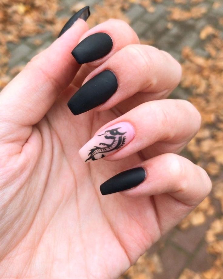 Sophisticated Nail Design: Matte Black and Soft Pink with Artistic Accent.