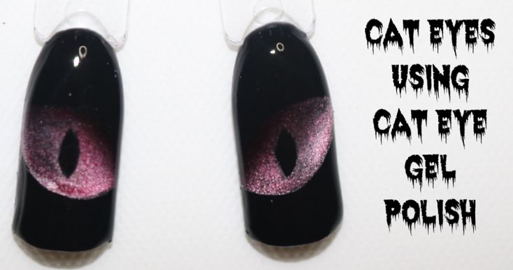 Captivating Cat Eye Nail Design: Bold Black Base with Vivid Pink Motifs