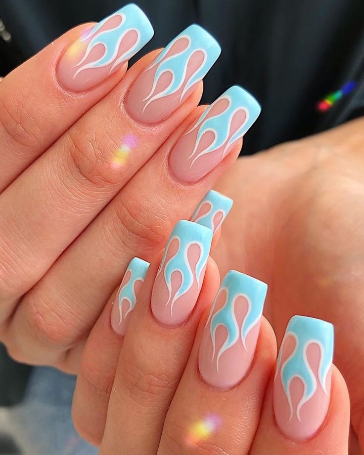 Vibrant Flame-Inspired Nail Design with Blue and Pink Hues for a Modern Statement.