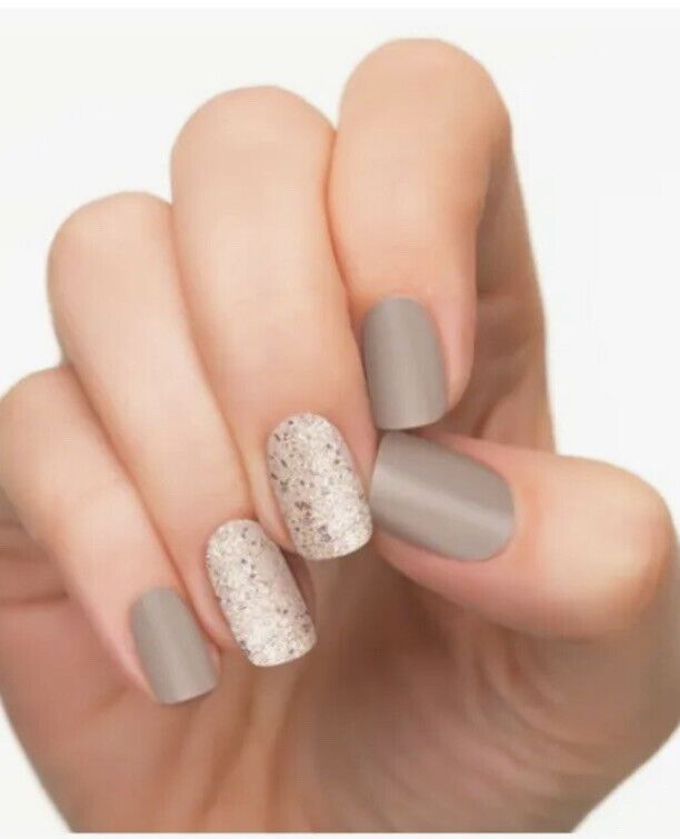 Sophisticated Taupe Nail Design with Matte and Glitter Finishes for Any Occasion.