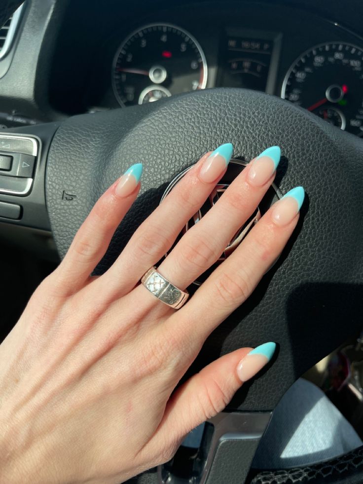 Chic Mint Green French Tip Manicure for an Elegant Pop of Color.