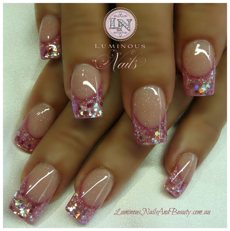 Sophisticated Gradient Nail Design with Pink Base and Glitter Tips