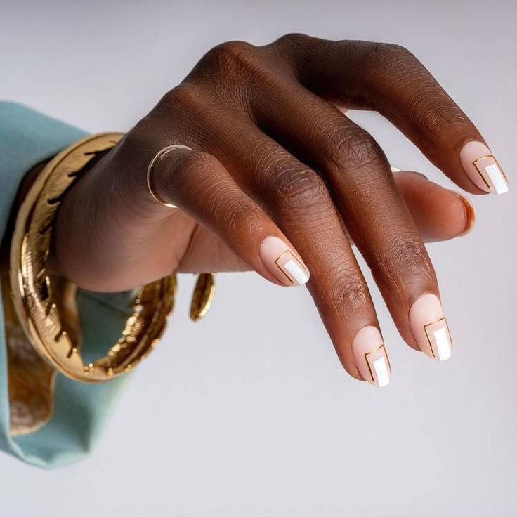 Chic Elegant Nail Design: Soft Nude and White Shades with Geometric Accents