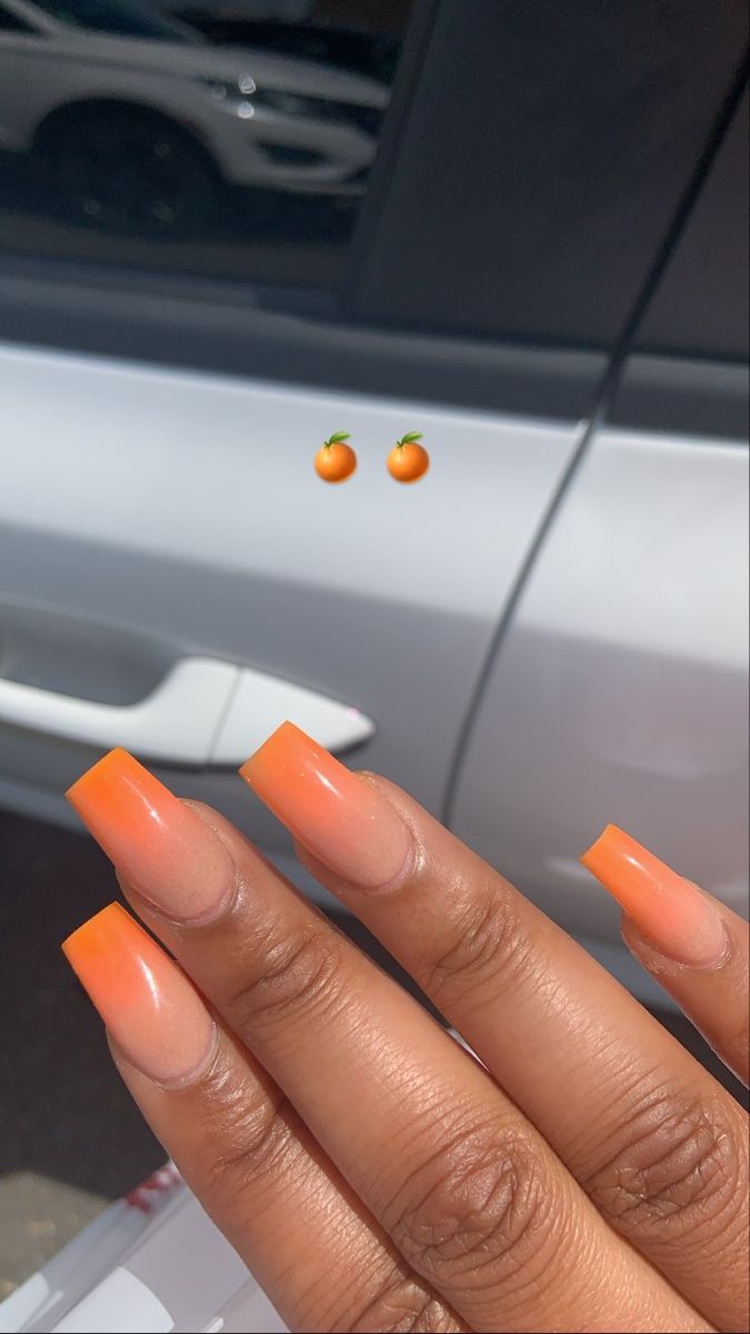 Playful Orange Ombre Nails: A Modern Summer Statement