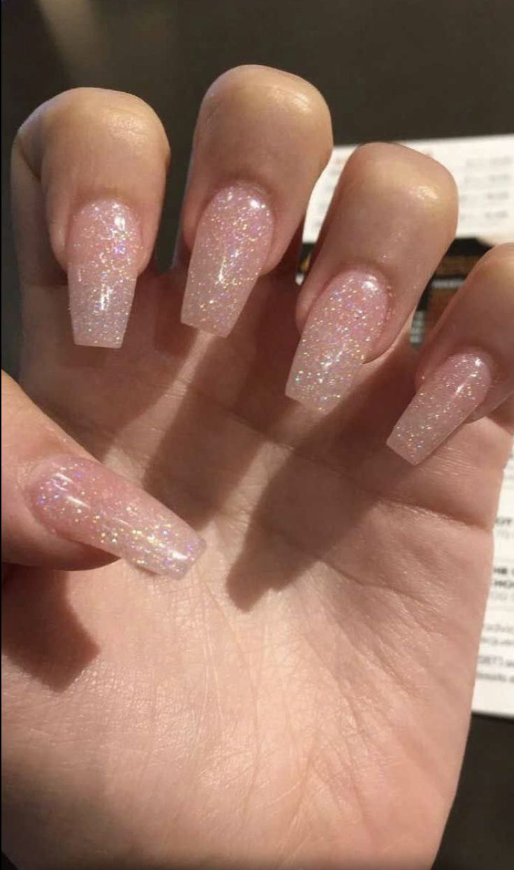 Elegant Pink Acrylic Nails: A Playful Sparkle for Any Occasion