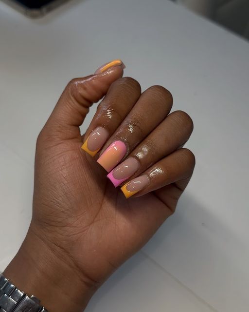 Chic Almond-Shaped Manicure with Vibrant Colorful Tips and Nude Base.